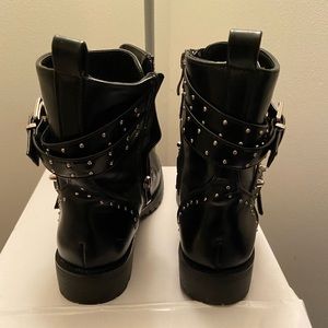 Women’s black biker boot.
